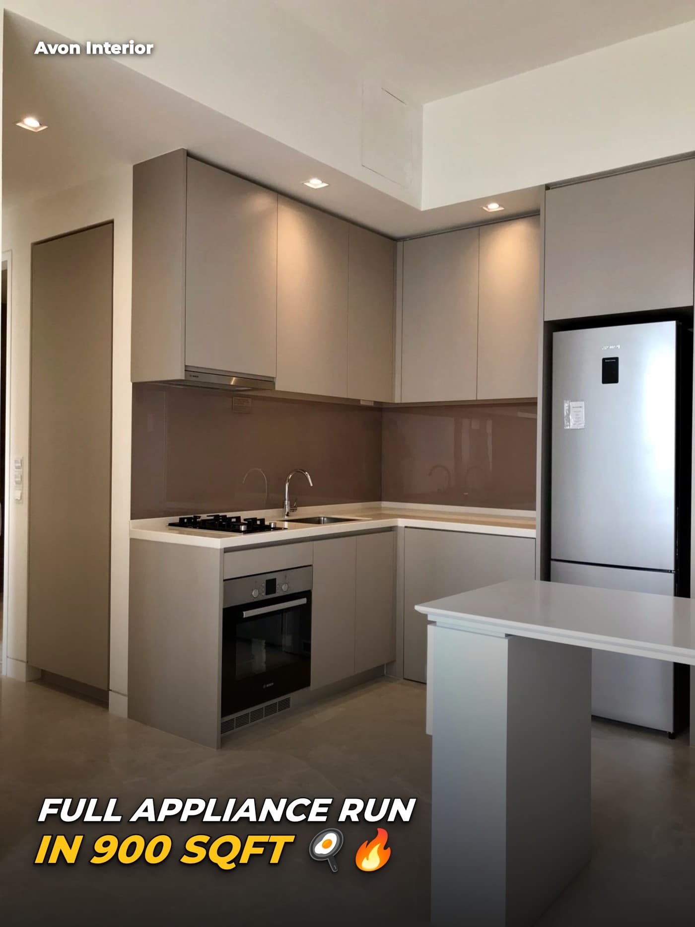 Highline kitchen with integrated appliances. Headline on the image: Full appliance run in 900 sqft