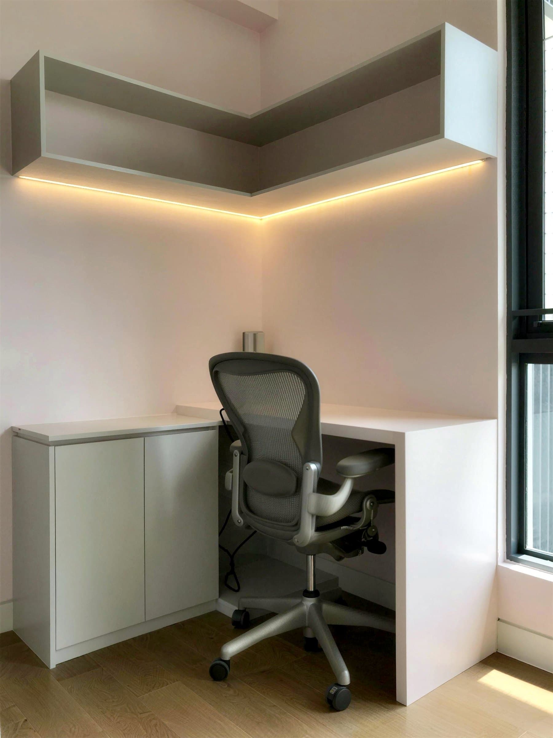 Built-in study nook with backlit shelf