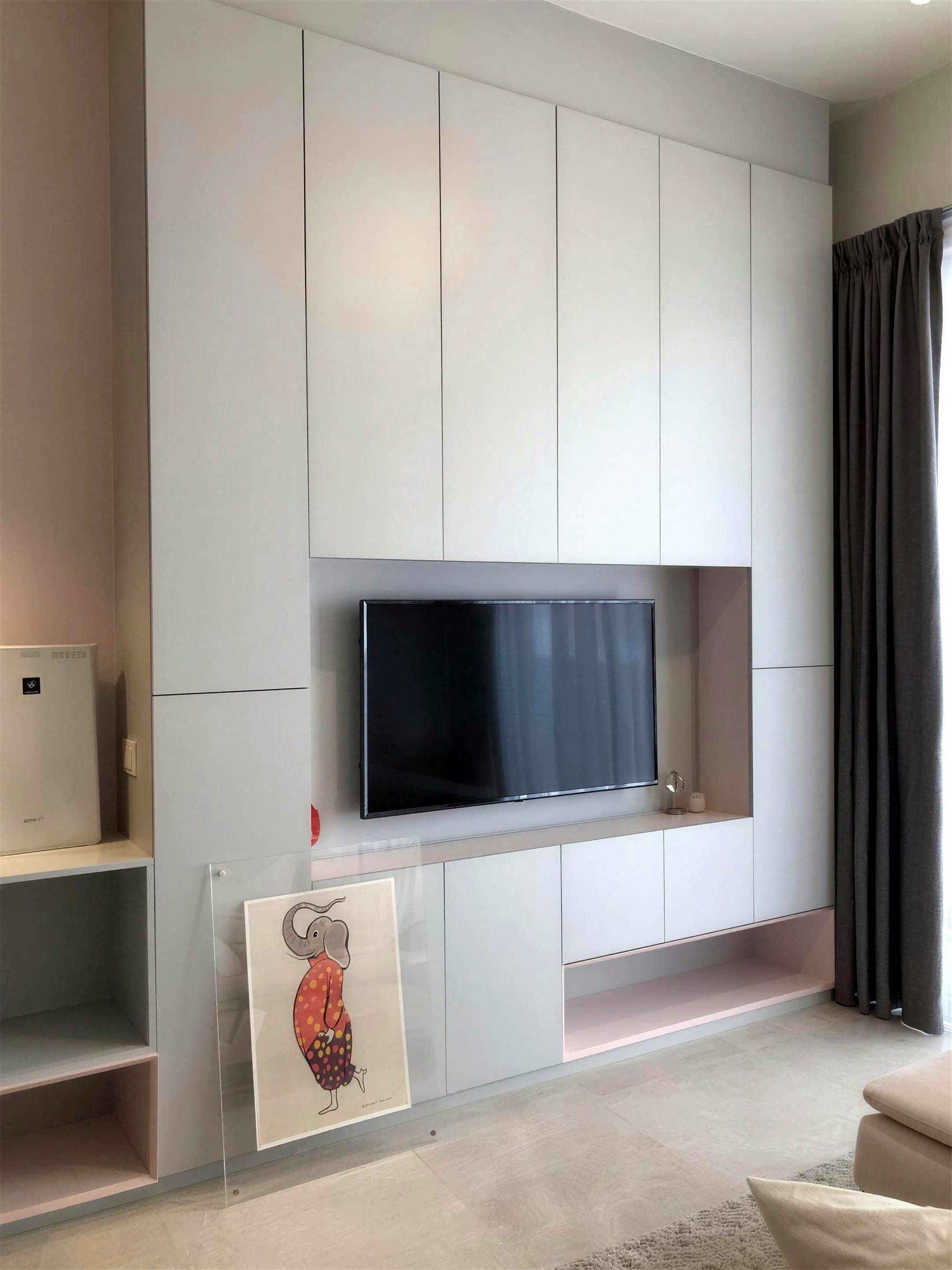 Full-height TV feature wall with backlit niche