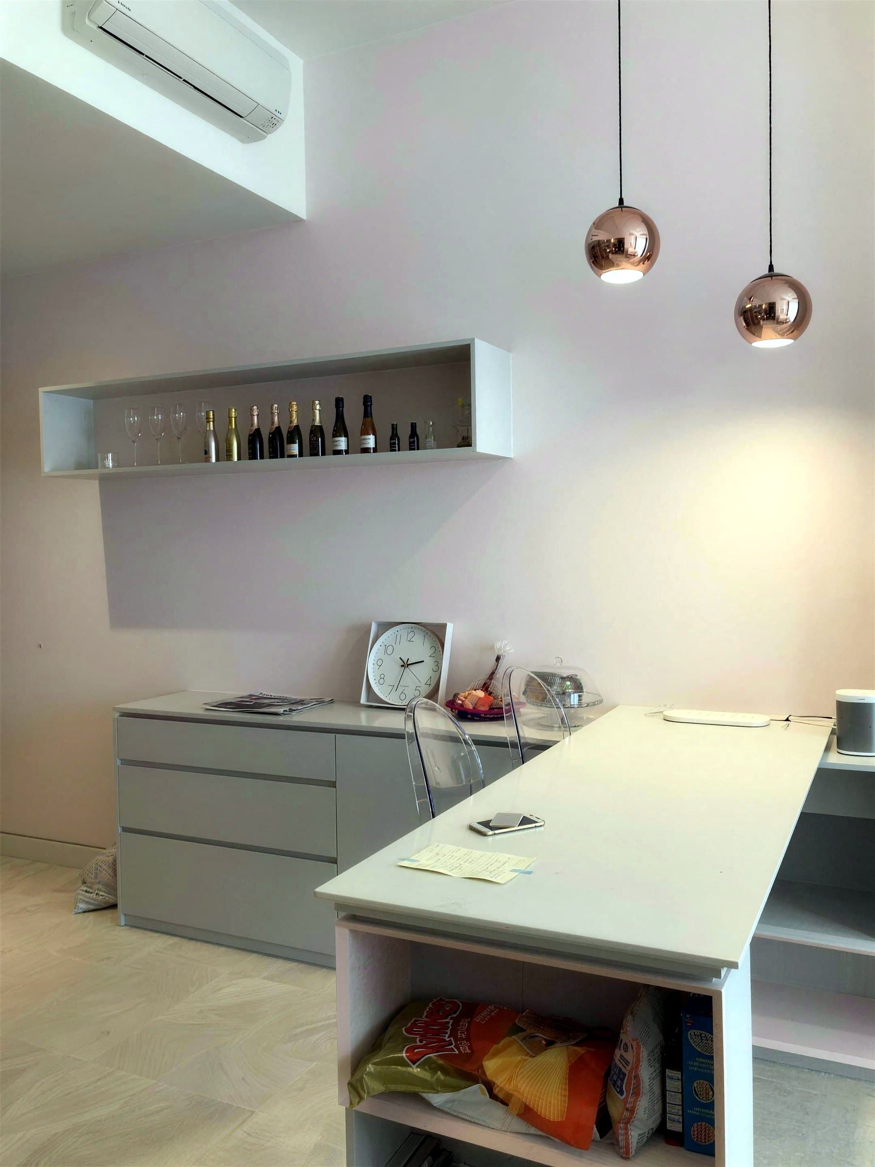 Built-in wine display niche beside the pantry