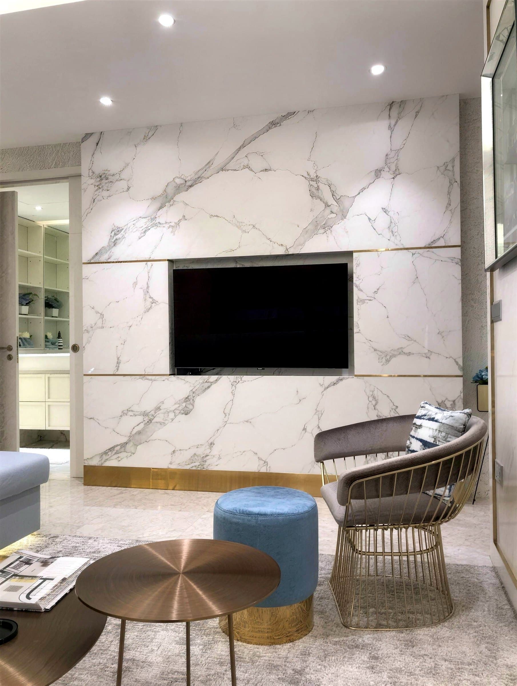 Marble-look feature wall built around the television