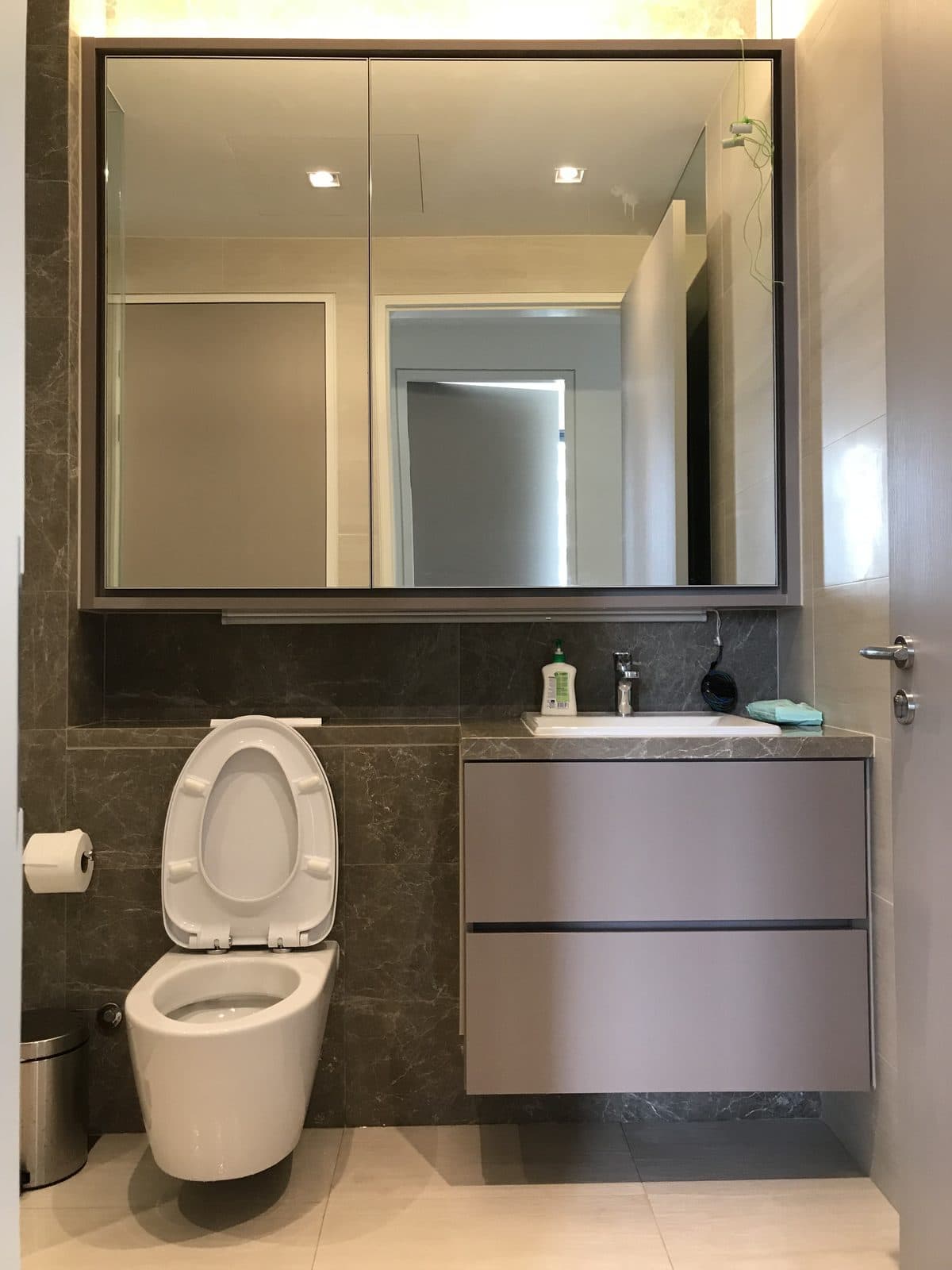 Bathroom vanity with framed mirror