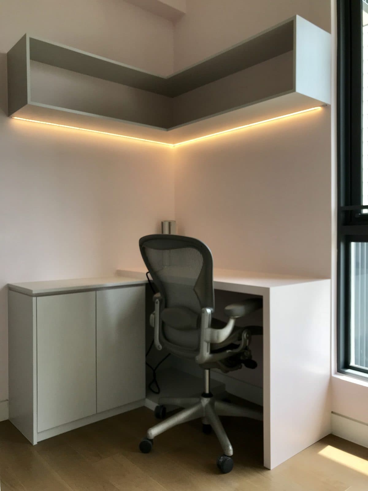 Study nook with backlit shelf