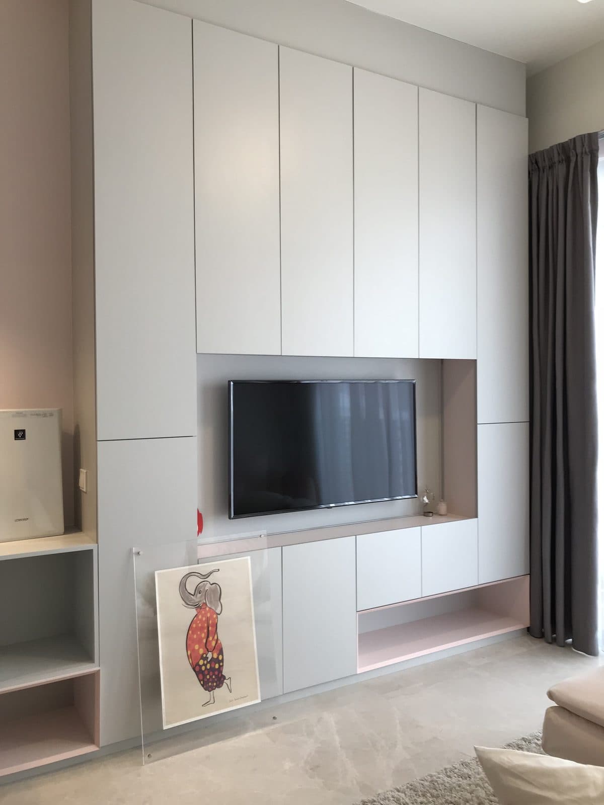 Full-height TV feature wall with backlit niche