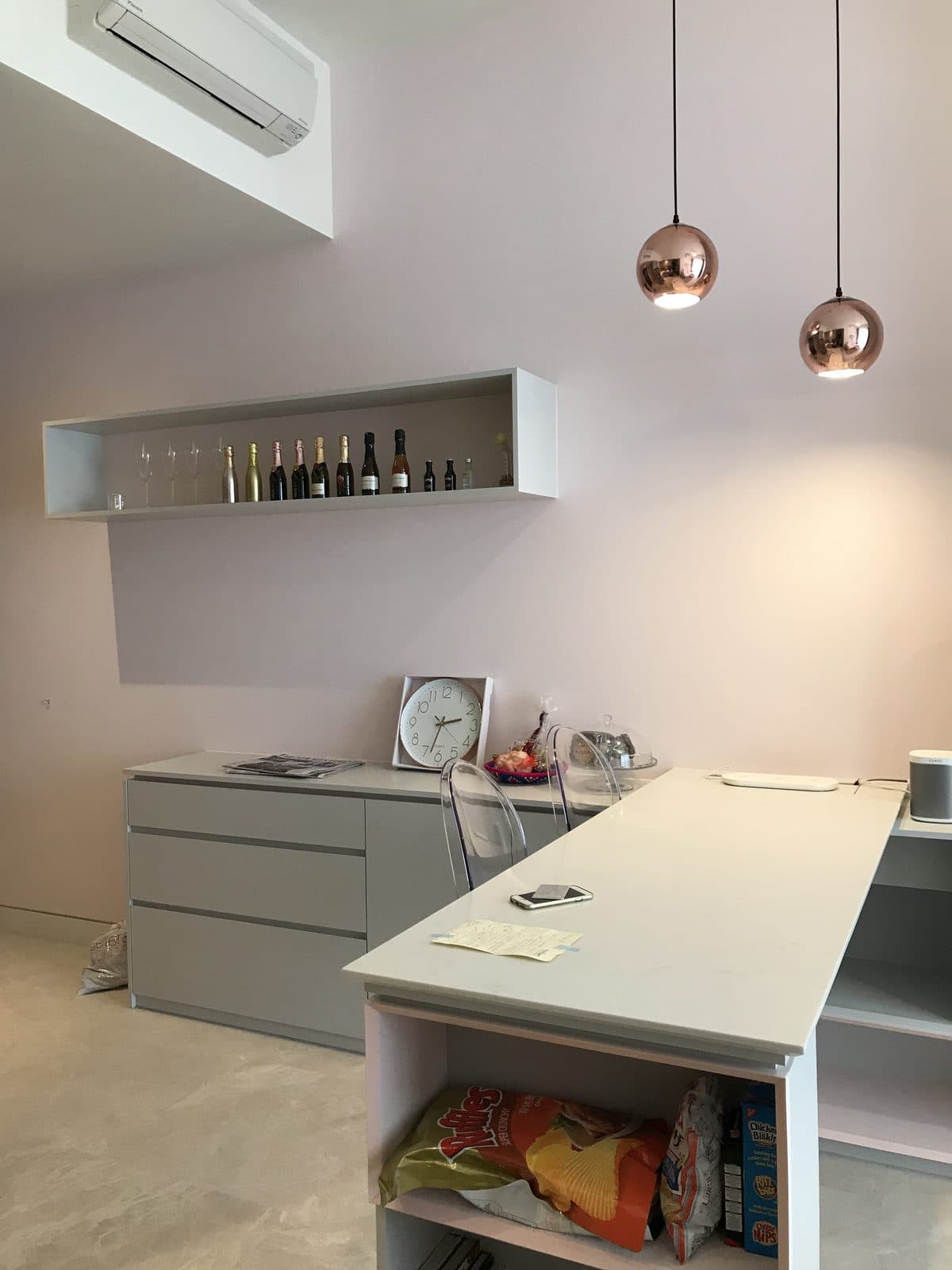 Built-in wine display niche beside the pantry