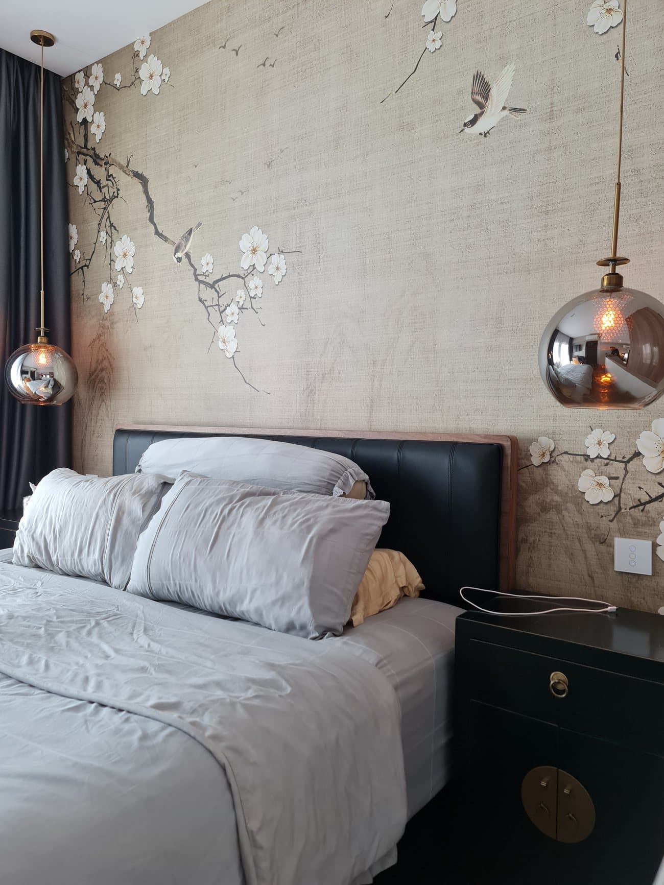 Bedroom with blossom feature wallpaper