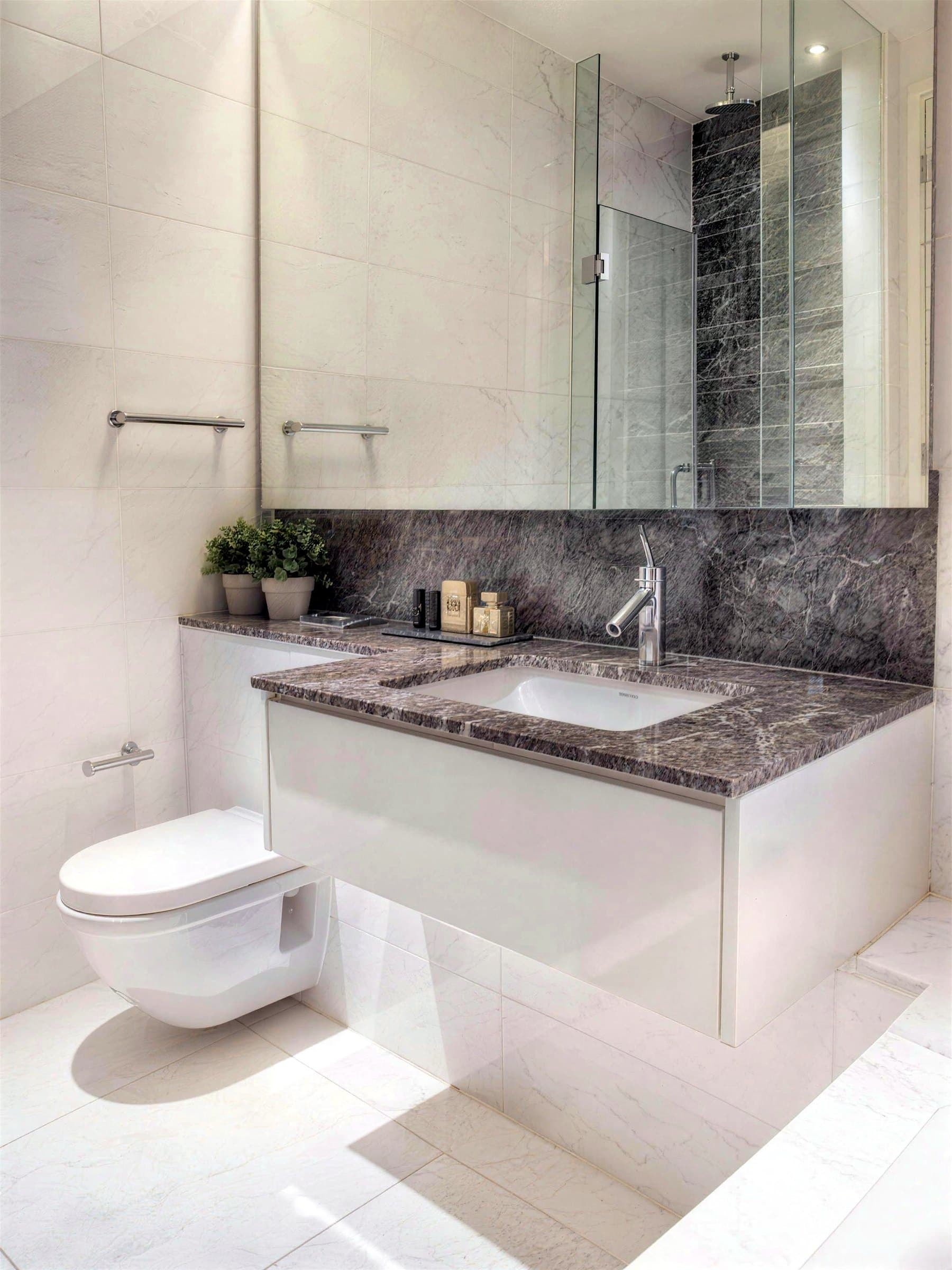 Bathroom with a wall-hung vanity and marble countertop