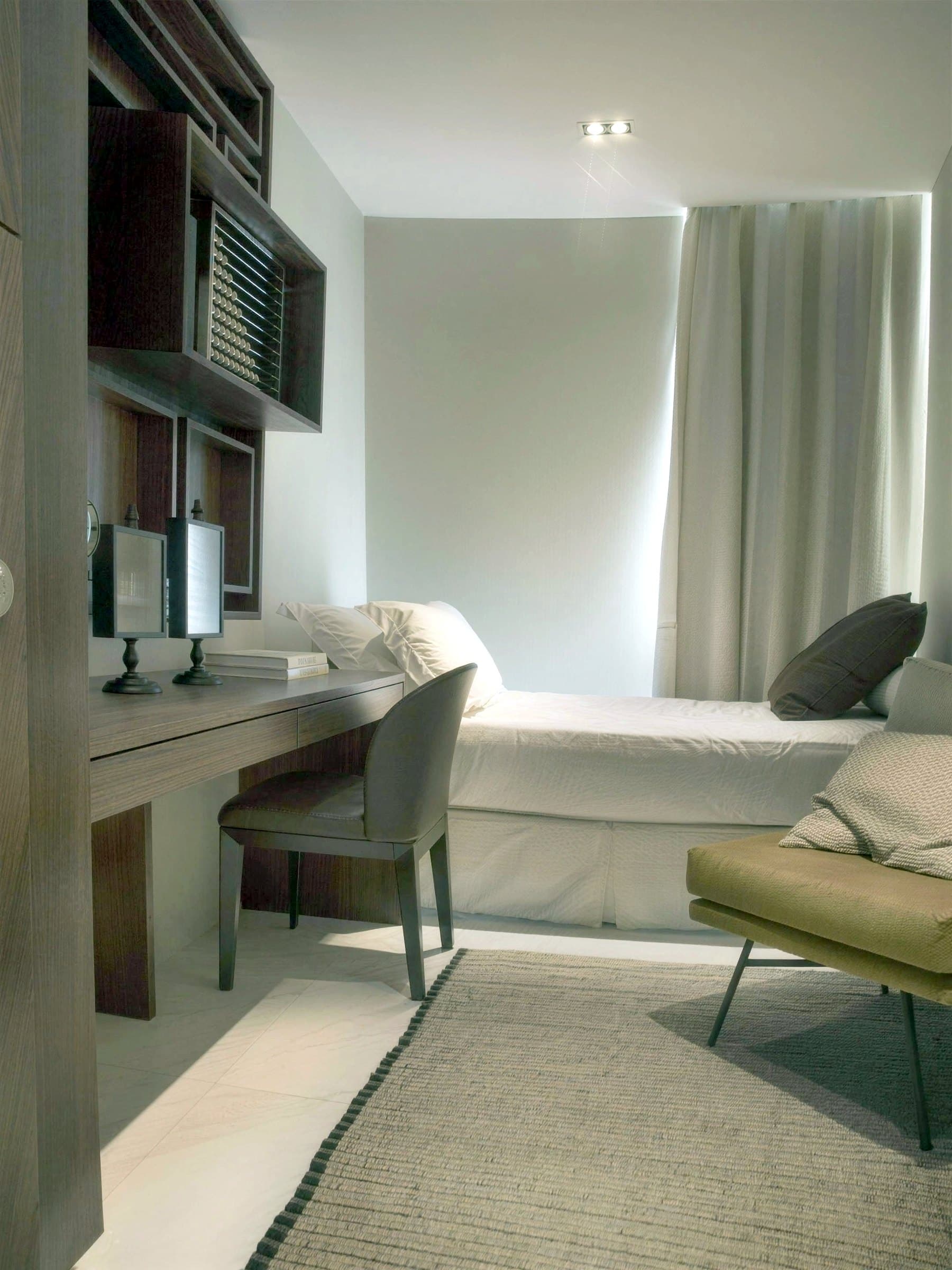 Study with a built-in desk and timber shelving